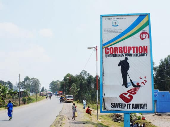 Corruption undermines your integrity - sweep it away! Road sign just before the Rwanda-Uganda border crossing.