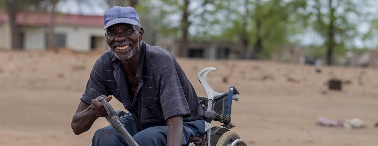 Ezekiel Rukuruva, 62, preparing a rainwater channel near his home in a food-insecure area of Chiredzi, Zimbabwe, and linked to us through CBM-partner Jairos Jiri Association.