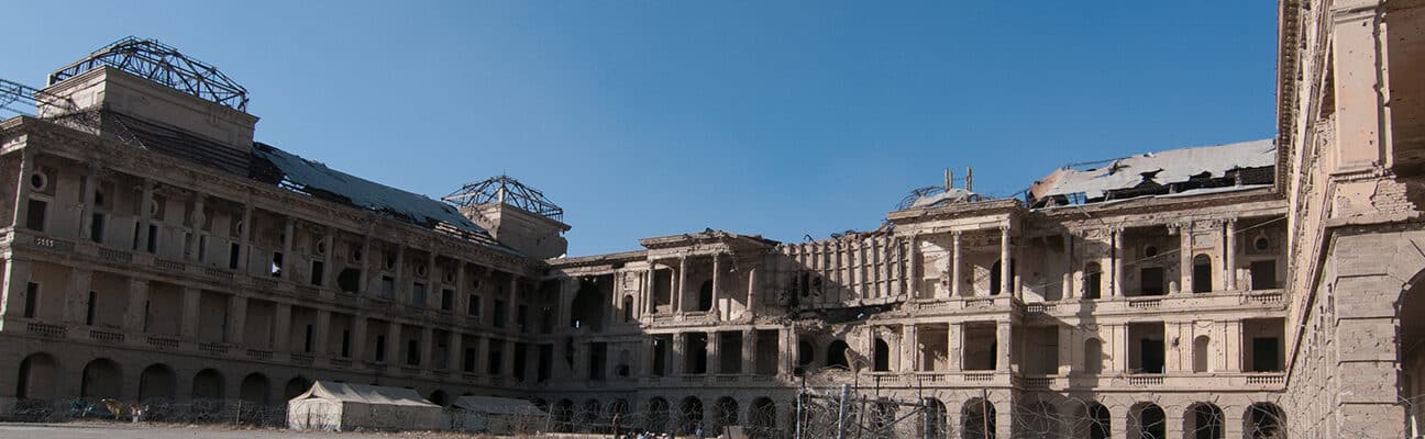 Aman Palace, Kabul. Formerly the Ministry of Defence, the building was badly damaged in shelling and mortar fire in the Mujahideen era. It has been demined and internally displaced people now live in the ruins.