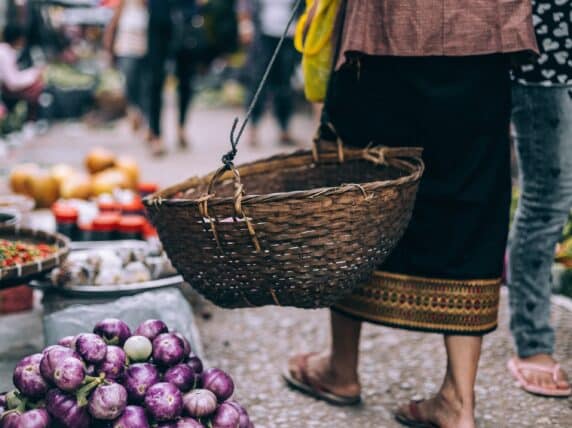 Woman carries a basket