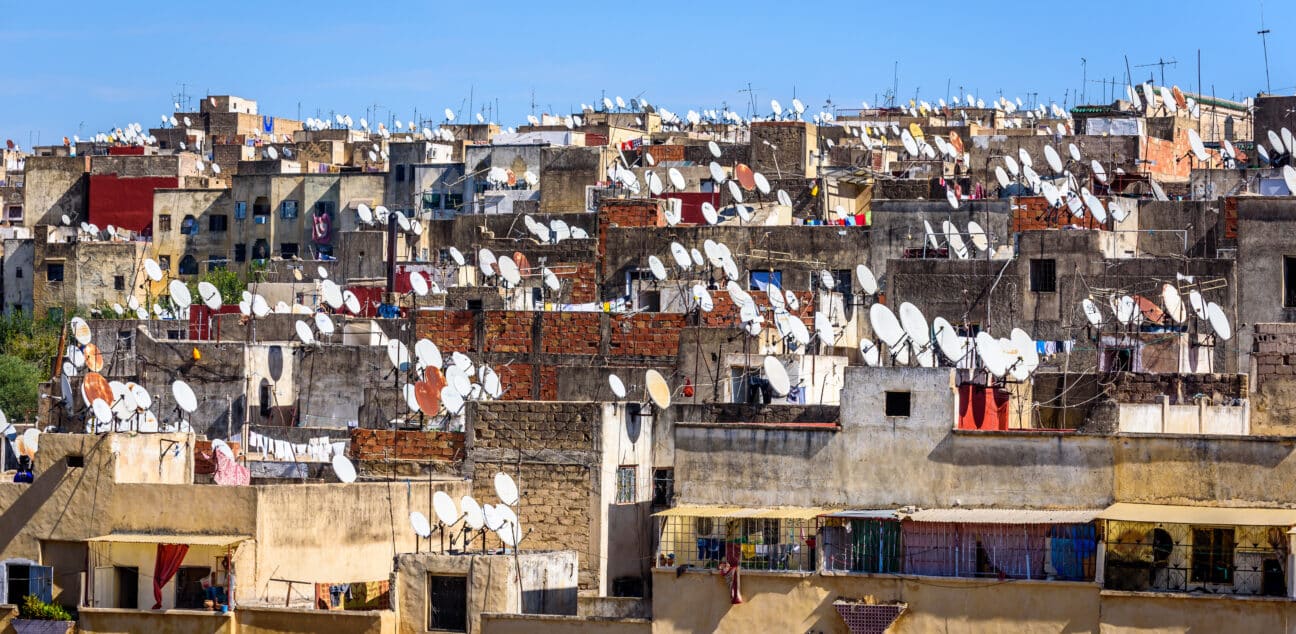 Rooftops with satellite dishes