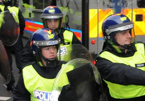 PROTESTERS AND RIOT POLICE CLASH DURING A TUC ORGANISED AUSTERITY RALLY. THE RALLY DREW AN ESTIMATED 250,000 PEOPLE TO THE BRITISH CAPITAL WITH A MINORITY OF PROTESTERS CLASHING WITH POLICE AND VANDALSING PROPERTY.