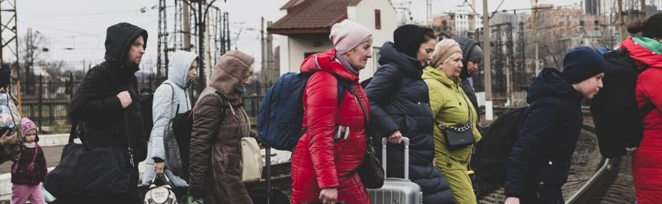 Ukrainians arriving at the train station in Lviv, Ukraine