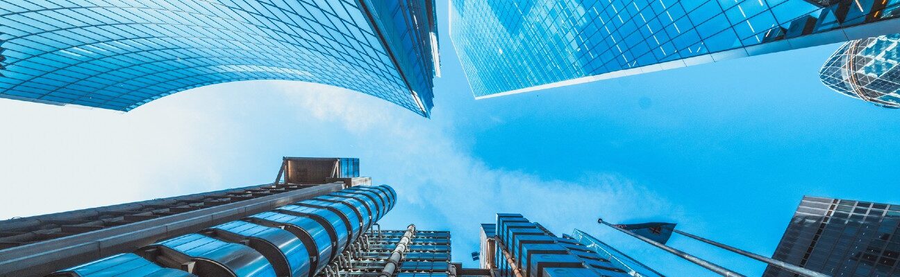 Upwards shot of buildings with the sky in the middle